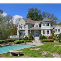 <p>The house at 142 Five Mile River Road in Darien is open for viewing on Sunday.</p>