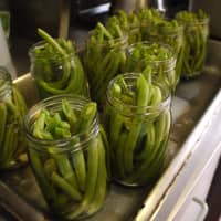 <p>Each batch of Dilly Beans she makes takes 20 minutes from the time she starts putting in the pickling ingredients to the time she takes the jars out of the boiling water. </p>