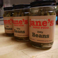 <p>Once the jars have set, about 24 hours later, it&#x27;s time to put the labels on and they&#x27;re ready to be sold at farmers markets around the Fairfield County. </p>