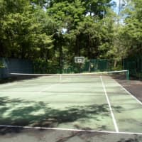 <p>The home also offers a tennis court for prospective homeowners.</p>