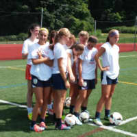 <p>Byram Hills High School girls soccer players set to do a drill during the opening day of summer practice Monday, Aug. 18. </p>