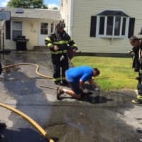 <p>Assistant Chief Schuyler Sherwood, Lt. Lee Corbo, Andy Darrow and Brian Madia were among the Fairfield Fire Department members who responded to the report of a gas leak on Monday, Aug. 18. </p>