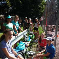 <p>A group of up-and-coming tennis players at Hastings High School girls tennis get ready for practice.</p>