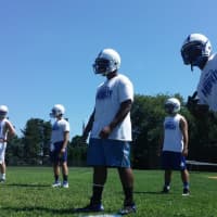 <p>Players learn gap responsibility at afternoon practice at Ardsley High School on Tuesday, Aug. 19.</p>