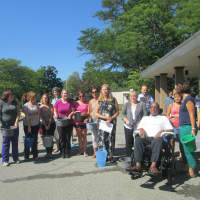 <p>Employees at Cedar Manor prepare to take the ice bucket challenge. </p>
