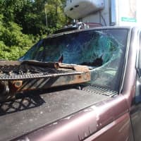 <p>A Chevy Suburban was rear-ended and smashed into a car carrier on I-95 in Westport on Tuesday morning. </p>