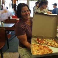 <p>Abby Katz picks up food for the whole family at Sal&#x27;s Pizza. </p>