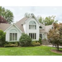 <p>This house at 27 Pheasant Hill Road in Weston is open for viewing on Sunday.</p>