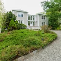 <p>The house at 411 Thayer Pond Road in Wilton is open for viewing on Sunday.</p>