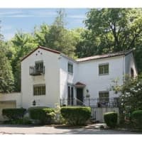 <p>This house at 1126 Post Road in Scarsdale is open for viewing on Sunday.</p>