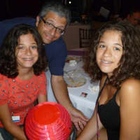 <p>Chappaqua resident Fred Robustell with his daughters, Elena and Vanessa. </p>