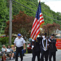 <p>Bedford Hills firefighters march in the Mahopac parade.</p>