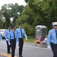 <p>Pound Ridge firefighters march in the Mahopac parade.</p>