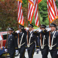 <p>Lake Carmel firefighters march in the Mahopac parade.</p>