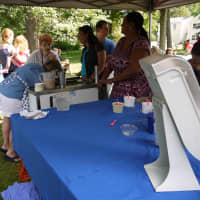 <p>Nearly 200 people showed up at Norwalk State Sen. Bob Duff&#x27;s house Sunday afternoon for a bi-annual ice cream social. </p>