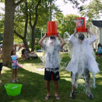 <p>Norwalk State Sen. Bob Duff and Ridgefield&#x27;s Dr. Shawn Tittle both dumped buckets of ice water over their heads in response to their ALS Ice Bucket Challenges. </p>