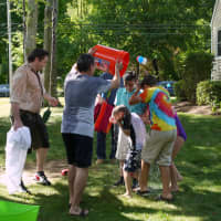<p>Norwalk State Sen. Bob Duff and Ridgefield Dr. Shawn Tittle both dumped buckets of ice water over their heads and several of the kids in attendance Sunday, in response to their ALS Ice Bucket Challenges. </p>