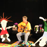 <p>Musician Kurt Gallagher will entertain children with song and instruments at the Farmers Market on the New Rochelle Library Green on Saturday.</p>