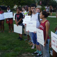 <p>Geovanna Borden (right), a Purchase College student, attends the Manhattanville College vigil for Michael Brown. </p>
