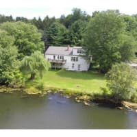 <p>This house at 23 Faraway Road in Armonk is open for viewing on Saturday.</p>