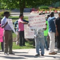 <p>Friends, relatives and fellow taxi drivers gather outside Stamford Superior Court to call for justice for Mahomed Kamal, who was stabbed to death early Wednesday. The man charged,  Shota Mekoshvili, made his first court appearance Friday.</p>