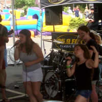 <p>Students of the School of Rock perform at the Blues, Views and BBQ Festival.</p>