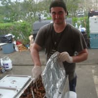 <p>James Farrell of Bobby Q&#x27;s serves up delicious barbecue at the Blues, Views and BBQ Festival.</p>