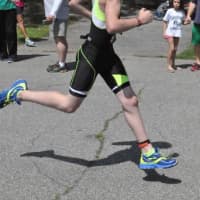 <p>Alex Carrazzone shown running the ToughKid Triathlon at West Point on Aug. 16. </p>