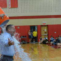 <p>Somers High School Principal Mark Bayer participates in the Ice Bucket Challenge.</p>