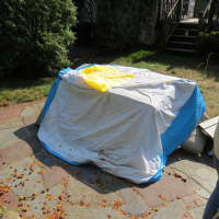 <p>The toy chest was catapulted across the patio by the speeding New Rochelle car. </p>