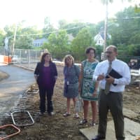 <p>Dr. Robert Shaps (right) talks about the Murray Avenue School stairs project. </p>