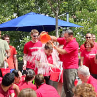 <p>HomeServe of Norwalk takes part in the Ice Bucket Challenge for ALS.</p>