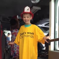<p>A boy from St. John&#x27;s gets an up close look at a fire truck. </p>
