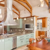 <p>A look a the kitchen at the home, which will be sold at an absolute auction on Sept. 20.</p>