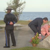 <p>Gov. Dannel Malloy and Lt. Gov. Nancy Wyman place flowers on the Sept. 11 memorial in Sherwood Island State Park.</p>