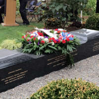 <p>Officials laid a wreath on the monument that bears the names of the six White Plains residents lost on Sept. 11, 2011. </p>