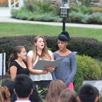 <p>Wooster School girls sing the National Anthem at the 9/11 ceremony in Danbury on Thursday morning. </p>