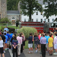 <p>Students and staff at Wooster School in Danbury gather for the ceremony to commemorate Sept. 11.</p>