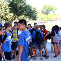 <p>Pelham Middle School students catch up on Sept 4, the first day of school. </p>