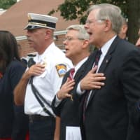 <p>Stamford&#x27;s city and state officials, including Mayor David Martin, second from right., sing the &quot;Star Spangled Banner.&quot;</p>