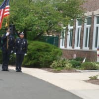 <p>The New Canaan Police Honor Guard marches at the 9/11 ceremony Thursday morning.</p>