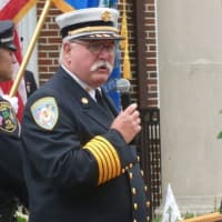 <p>New Canaan Fire Chief Jack Hennessey speaks during the 9/11 ceremony in New Canaan. </p>