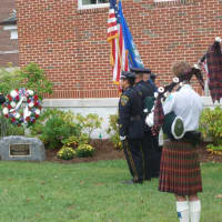 <p>A ceremonial wreath is placed during the New Canaan 9/11 ceremony.</p>