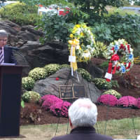 <p>A local rabbi delivers the benediction at the 13th annual 9/11 ceremony at Memorial Park. </p>