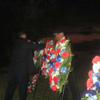 <p>Police lay a wreath at a Sept. 11 ceremony in Ossining.</p>