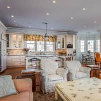 <p>There are five bedrooms and five bathrooms in the home. </p>