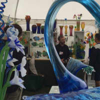 <p>Colorful glass lights up the Crafts at Lyndhurst festival this weekend in Irvington. </p>