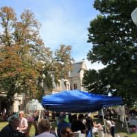 <p>Visitors browse around the vendors at the Lockwood-Mathews Mansion Museum&#x27;s 2013 Old-fashioned Flea Market.</p>