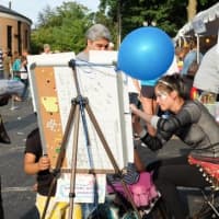 <p>Artists painting children&#x27;s faces was one of many activities at the Greek Festival, held Sept. 11-14. </p>