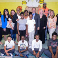 <p>Board executives and retired NBA player John Wallace attended the backpack outreaches.</p>